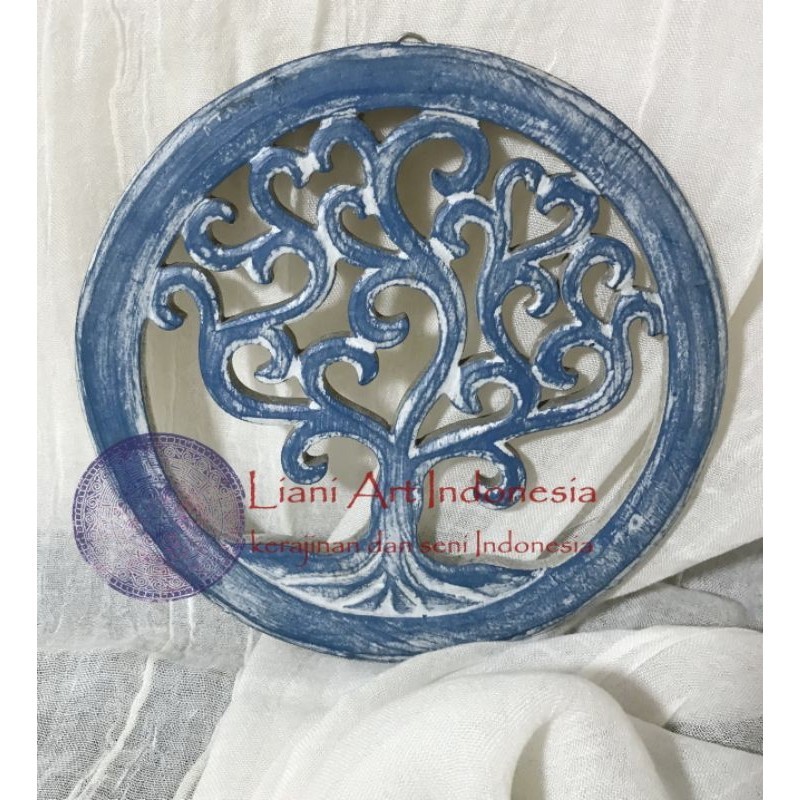 Ukiran Kayu Bentuk Lingkaran Motif Pohon