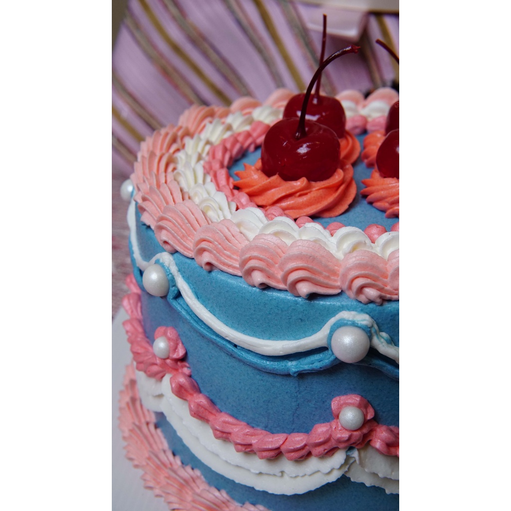 

BABY BLUE PASTELS VINTAGE CAKE
