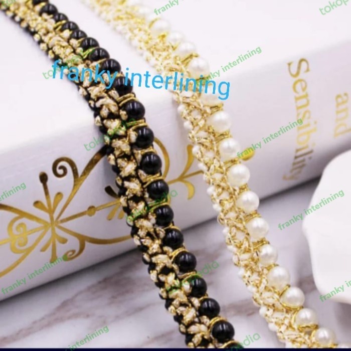 

RENDA MUTIARA TRIM LEBAR 1,5CM DIAMETER MUTIARA 6mm HARGA PER METER
