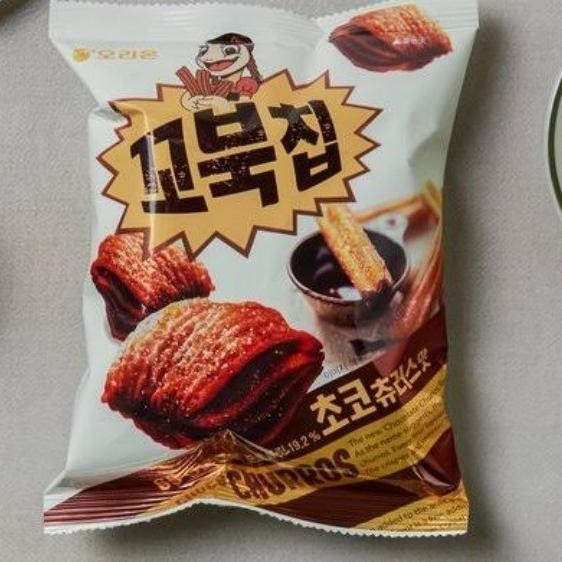 

orion turtle chip choco churros 136gr / makanan ringan churros coklat ES77