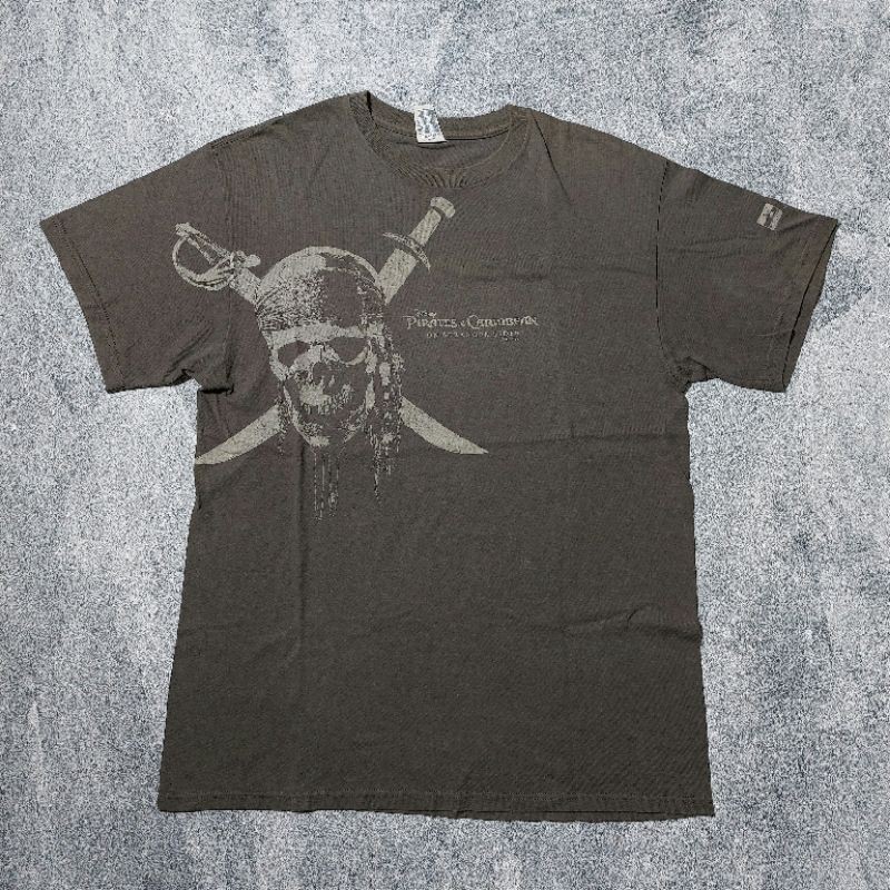 KAOS FILM PIRATES OF THE CARIBBEAN VINTAGE TAG DELTA PRO