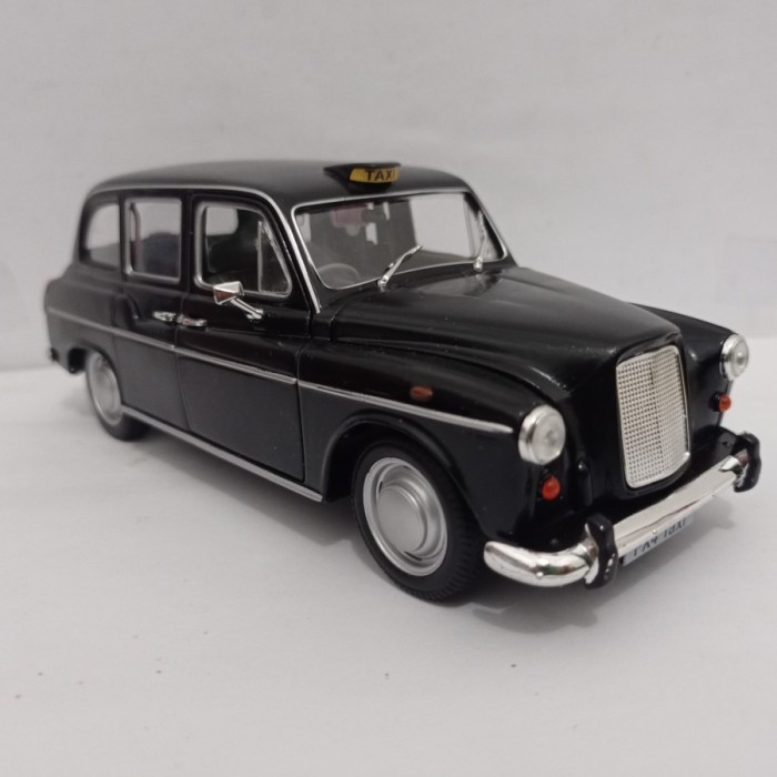 Diecast mobil London taxi Austin FX4 Welly 1:24 mainan pajangan