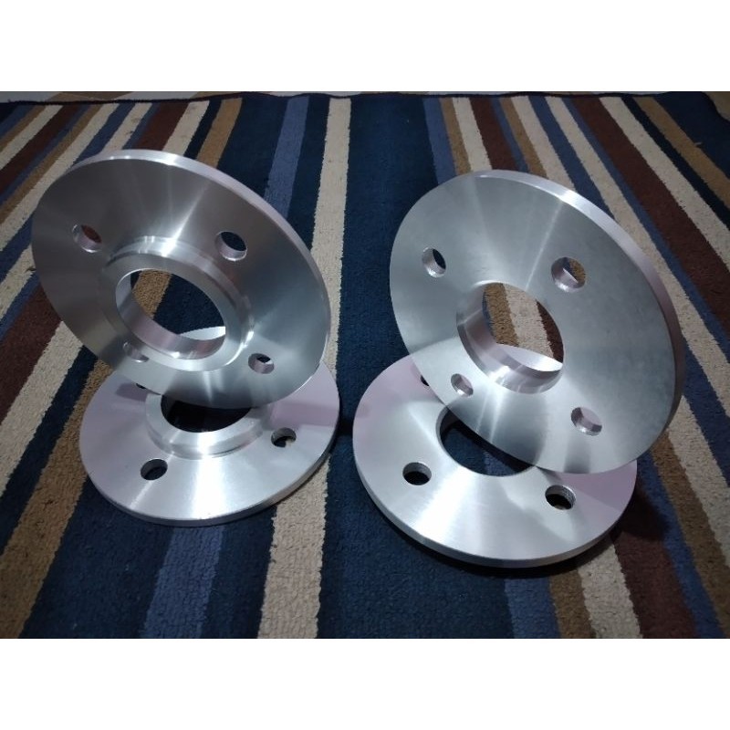 Spacer Nok Jazz/Brio pcd 4×100 tebal 4mm - 8mm