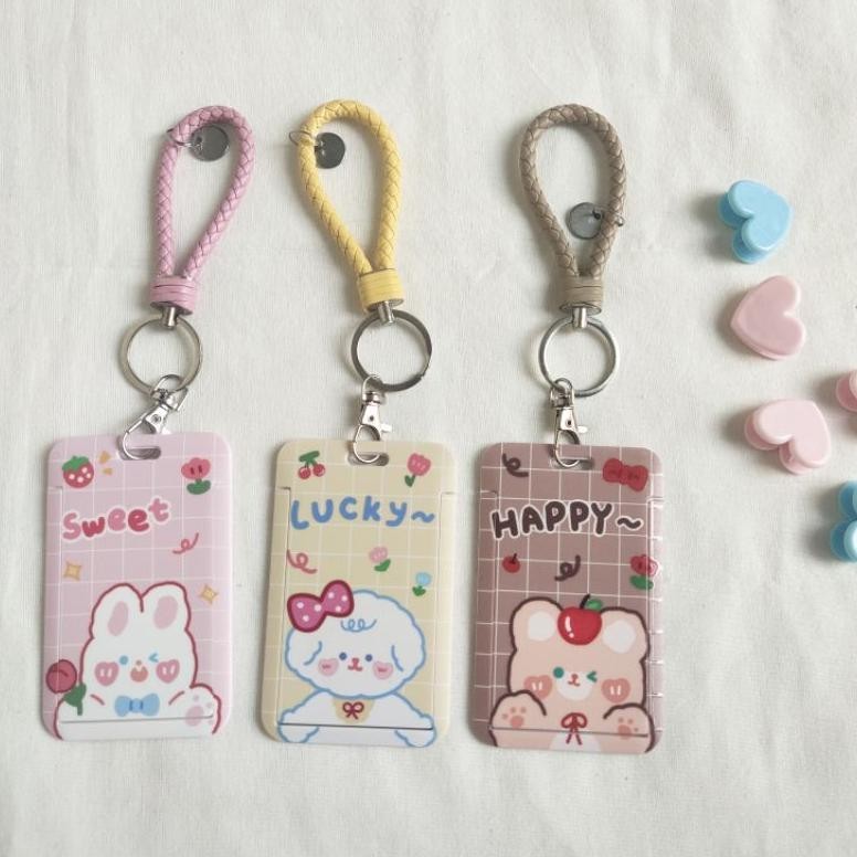 

ukd-23 READY LANYARD PHOTOCARD HOLDER TEMPAT PC KPOP CASE PHOTOCARD ID PHOTOCARD NAMETAG HOLDER PC KARTU BUS GANTUNGAN FOTO BTS ID CARD LUCU MOTIF BERUANG KELINCI WARNA UNGU PINK PUTIH KOREA Viral