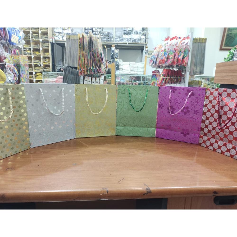 

Diskon Paperbag Gliter Motif Small / Tas Souvenir / Paper Bag Motif