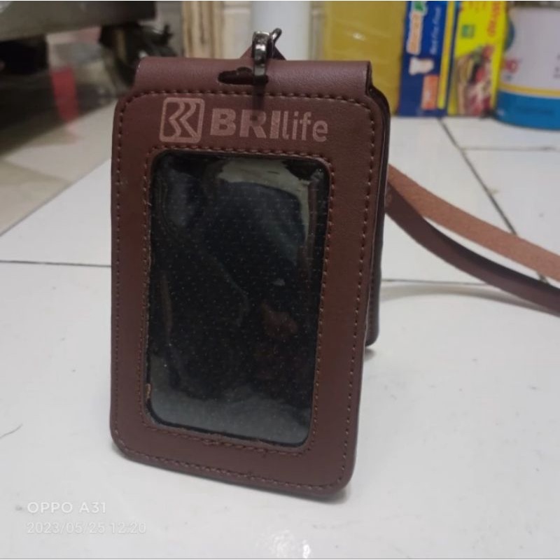 

HOLDER KALUNG ID CARD LOGO BNK BRI LIFE MODEL LIPAT COKLAT BEST QUALITY PREMIUM