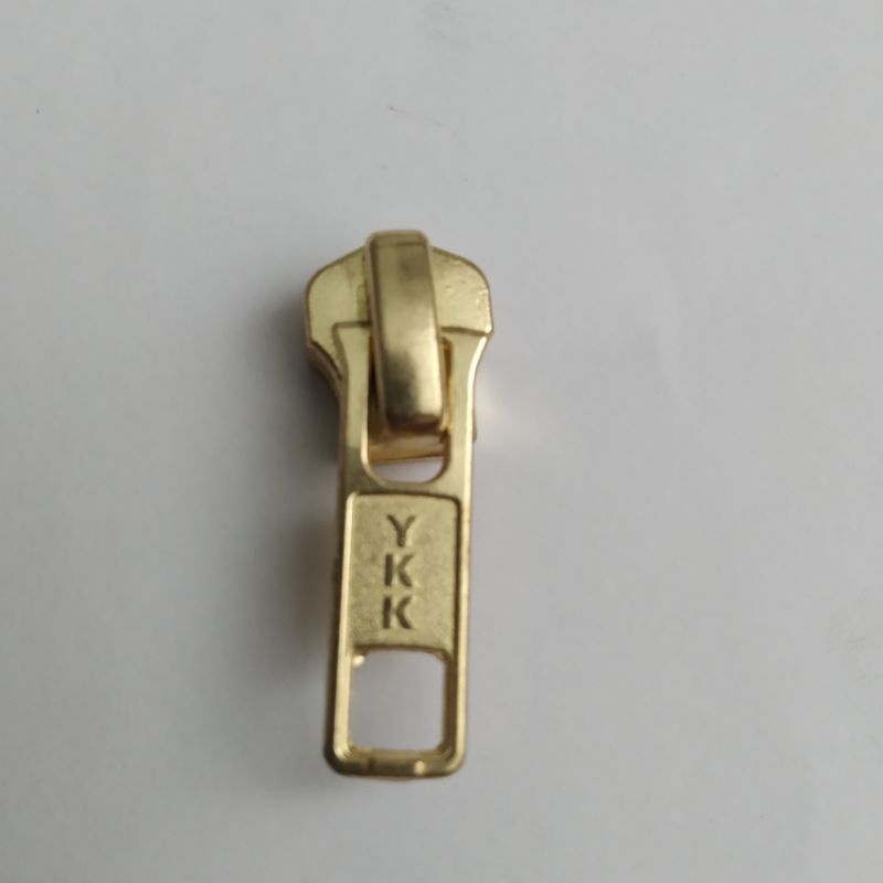 kepala resleting jaket besi