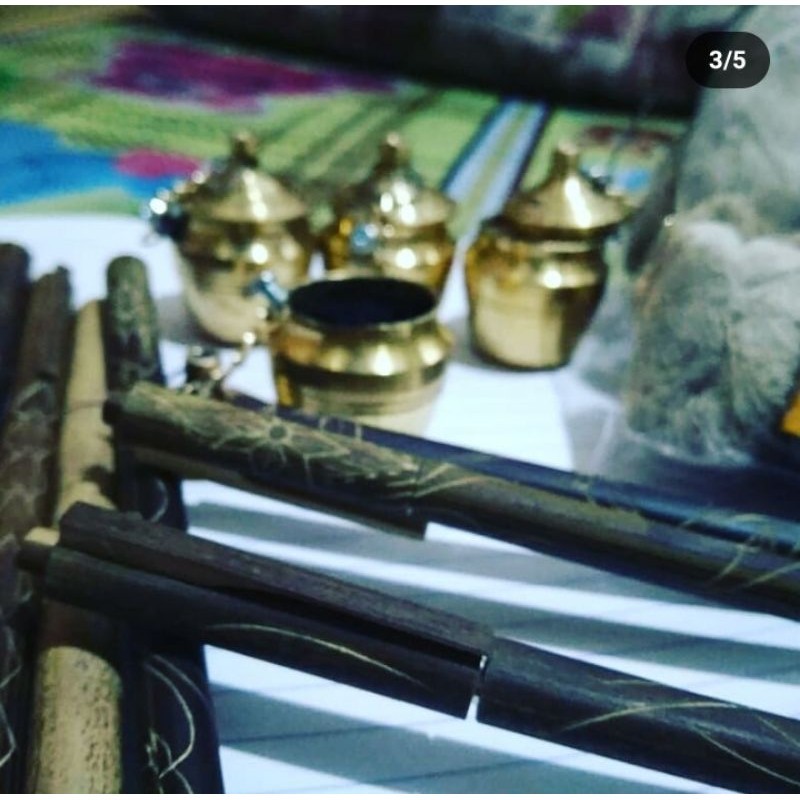 

Pena tutul bambu hitam ukir bisa pesan ukiran sesuai keinginan/cocok buat coret kitab kuning