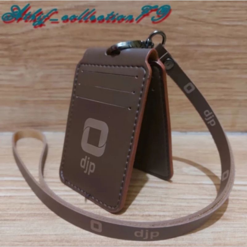 

HOLDER KALUNG ID CARD LOGO DJP MODEL LIPAT COKLAT BEST QUALITY PREMIUM