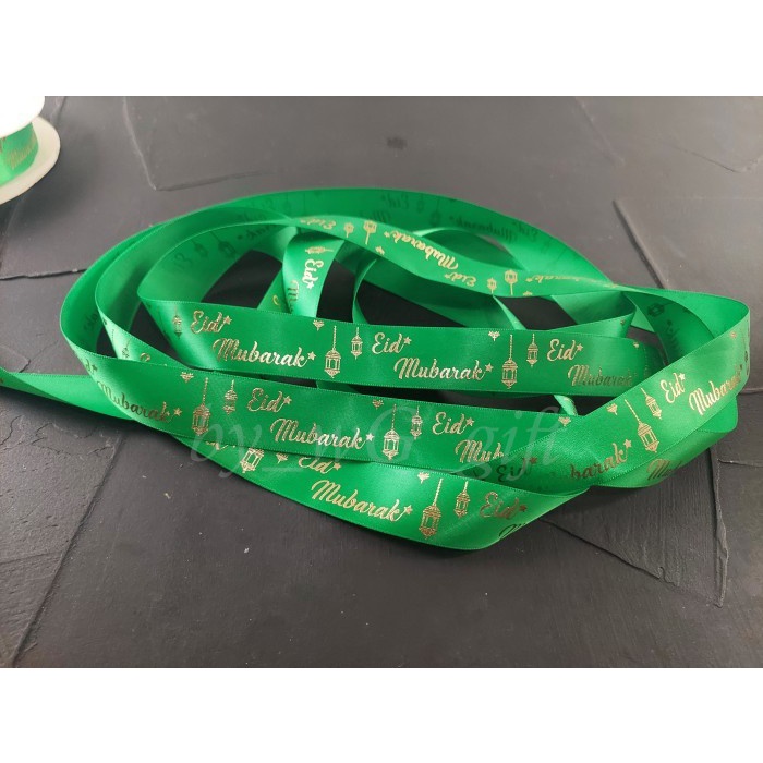 

Pita Idul Fitri -Satin Emboss Emas ;Lebar 2.5 cm ; Hijau