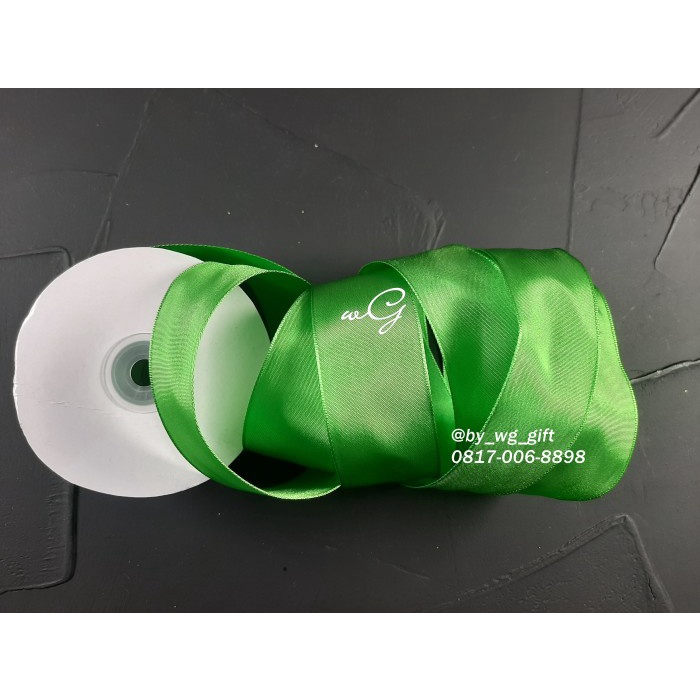 

Pita Kain Hijau Polos Pinggir Kawat; Lebar 3.8 cm; Panjang 25 yard
