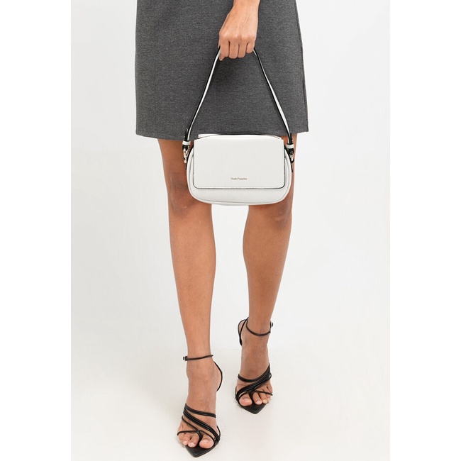 Tas Selempang Hush Puppies Original Wanita Sandang Sling bag bernuansa monokrom dengan siluet timele