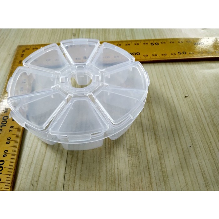 

Kotak plastik penyimpanan bulat/ pernak pernik uk.10,5 cm 8 lobang
