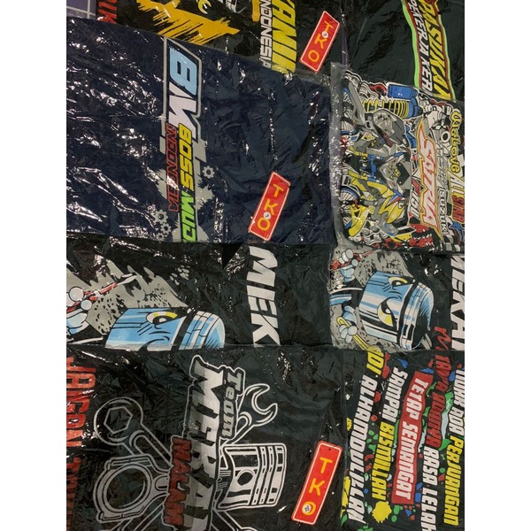 KAOS MEKANIK MUDA MOTOR RACING
