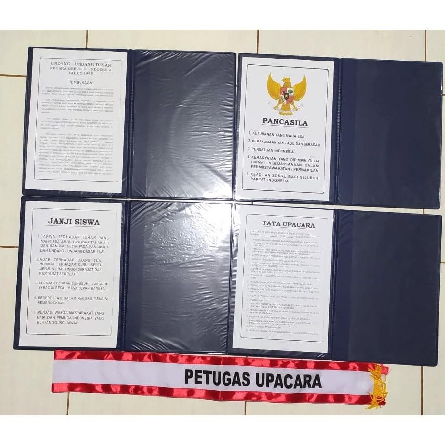 

RTY 5 MAP UPACARA BENDERA WARNA NAVY/BAHAN KULIT SINTETIS/SUDAH ADA TEKSNYA TERLARIS