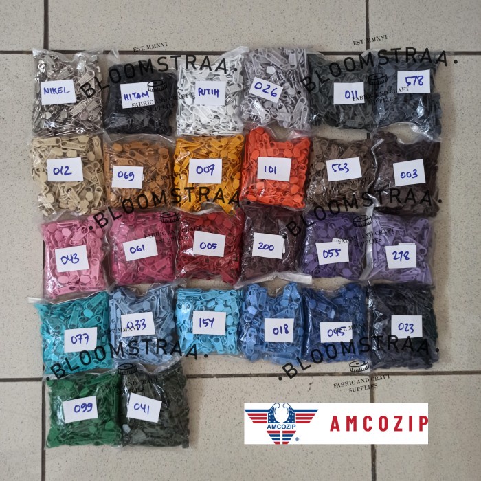 

GROSIR KEPALA SELETING AMCO 05 COIL ZIPPER HEAD PULLER RESLETING 100PC