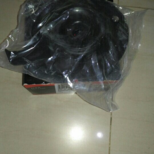 support shock belakang ford laser 323