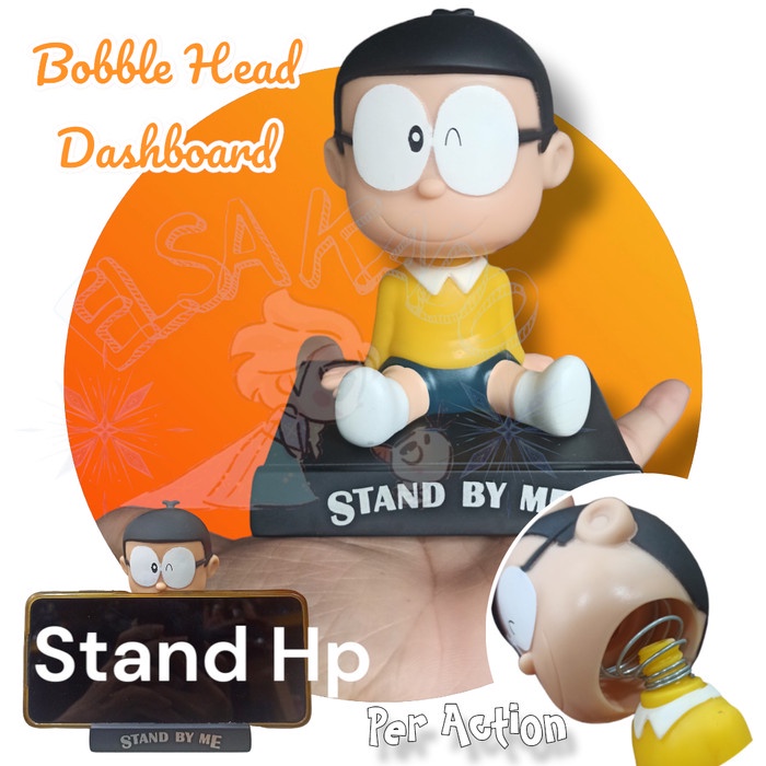 TERLARIS pajangan mobil dashboard boneka goyang doraemon nobita