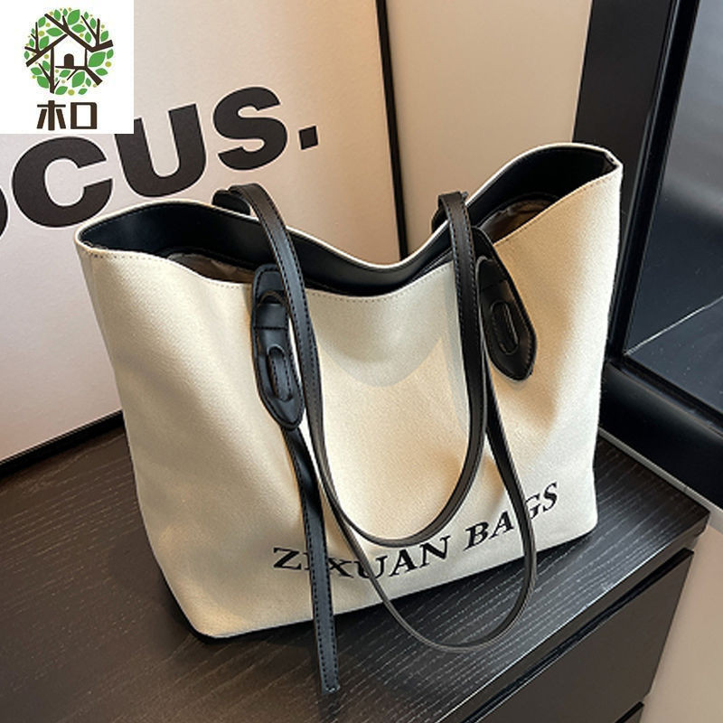 Tas Kanvas Wanita Kapasitas Besar Baru Niche Tas Kain Tas Bahu Tekstur Kelas Komuter