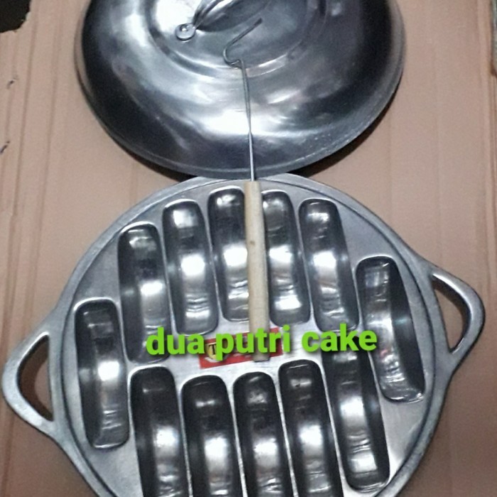 

WN976 cetakan kue pukis parabola super jumbo isi 12 lubang + pancongan PROMO