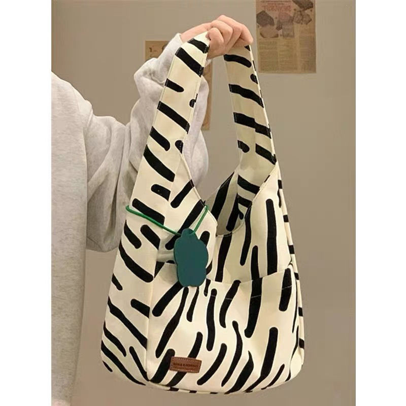 Tas Kanvas Garis-garis Zebra Kelas Tinggi Niche Baru Wanita