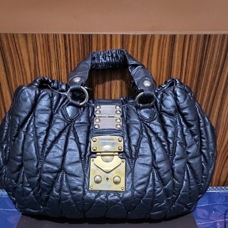 preloved tas wanita full kulit import merk M*u Mi*