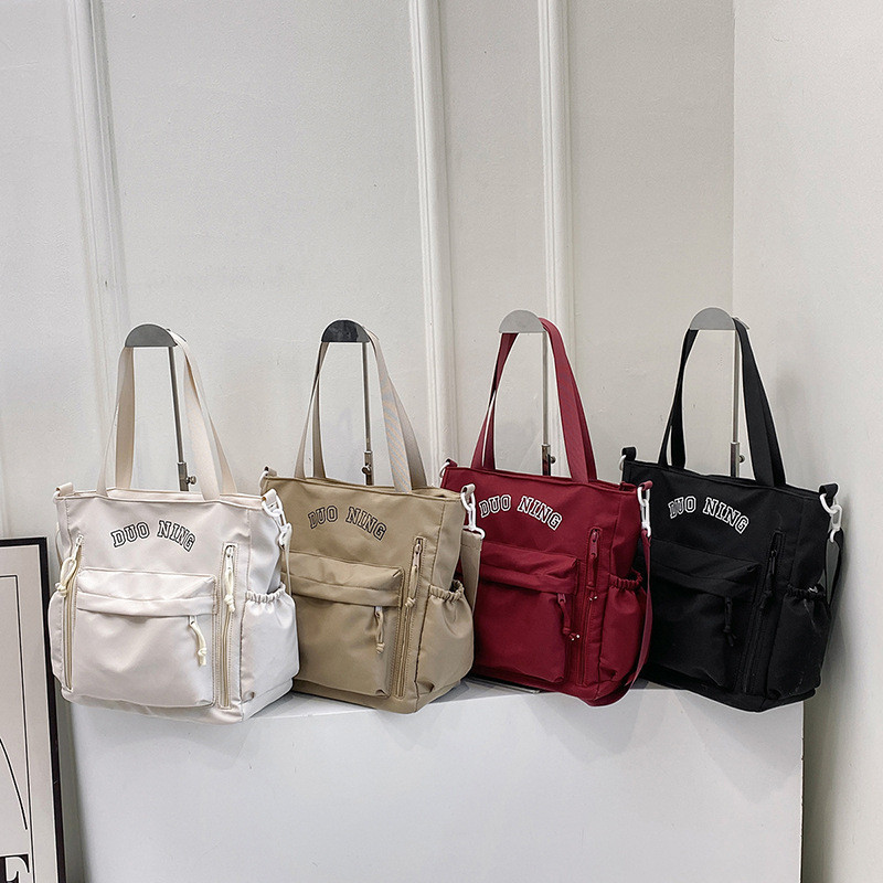 Tas Jinjing Nilon Tas Tangan Tas Buku Kapasitas Besar Tas Kanvas Tutorial Siswa SMP Kapasitas Besar 