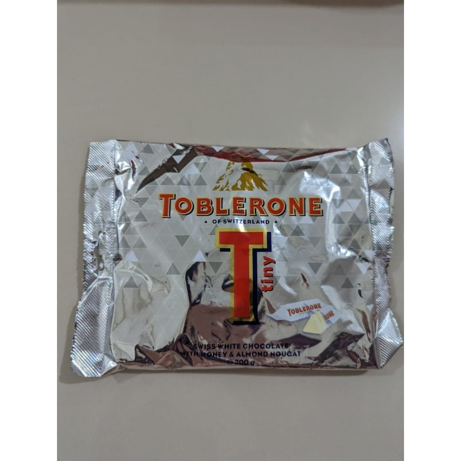 

Ready Coklat Toblerone Tiny White isi 25pcs