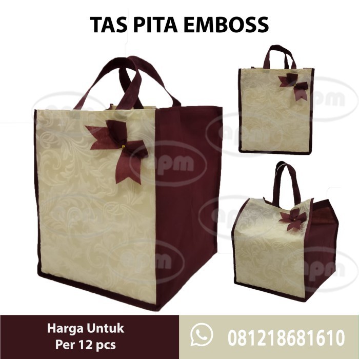 

HRG DISKON Tas Spunbond Pita Emboss Muat 2 Box Ukuran 20x20 cm / 22x22 cm