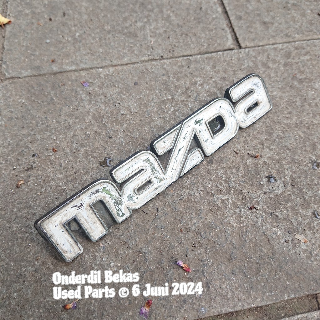 emblem grill mazda 323 elite trendy