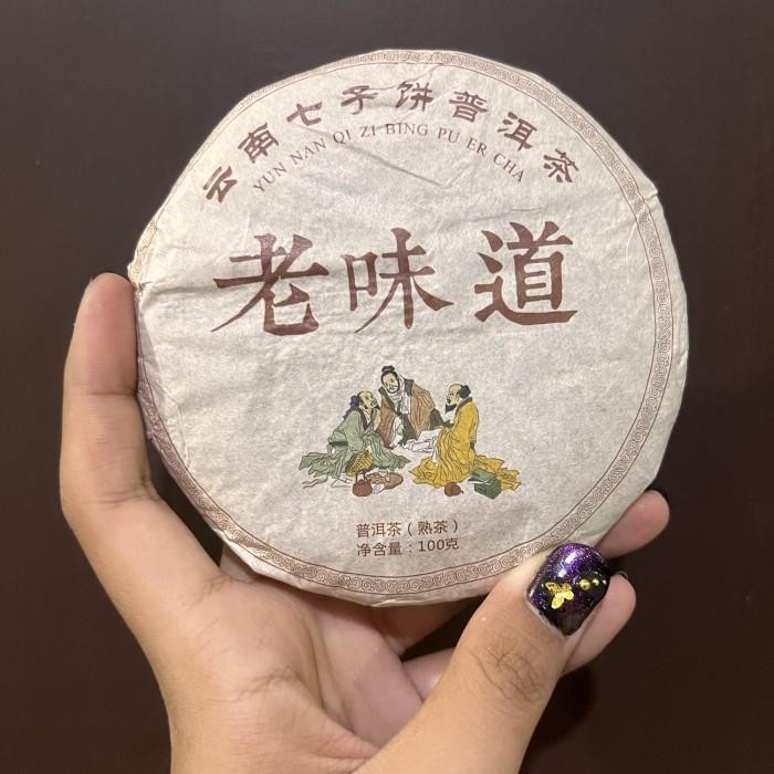 

Teh Yunnan qi zi bing pu er cha / pu er tea 100gr / yun nan Kualitas Terbaik