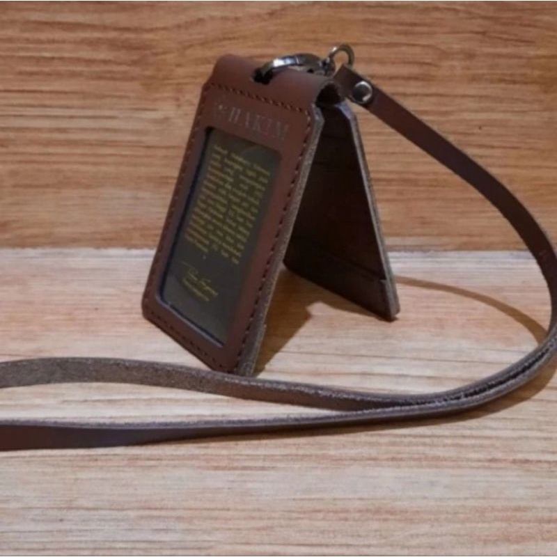 

HOLDER KALUNG ID CARD LOGO HAKIM KULIT ASLI COKLAT MODEL LIPAT BEST QUALITY PREMIUM