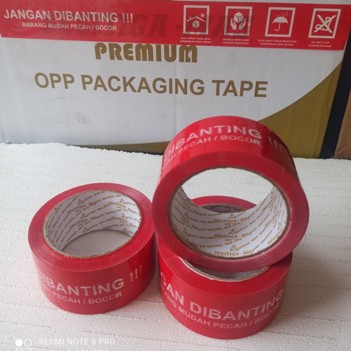 

Lakban FRAGILE MERAH/ PUTIH SEGITIGA MAS per Dus 48mmx90y khusus Gojek