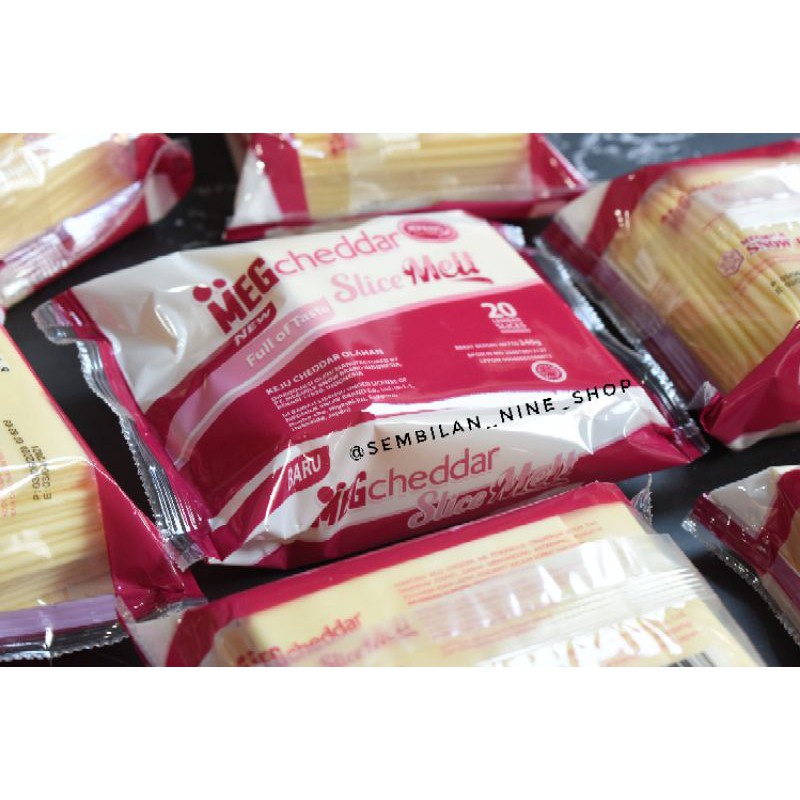 

Meg Cheddar Slice Melt 20 Pcs Slice Melt Keju Cheddar Cheese