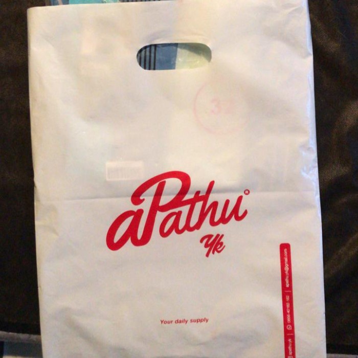 

cetakk sablon 1warna 2sisi tas plastik oval plong HD ukuran 35x50