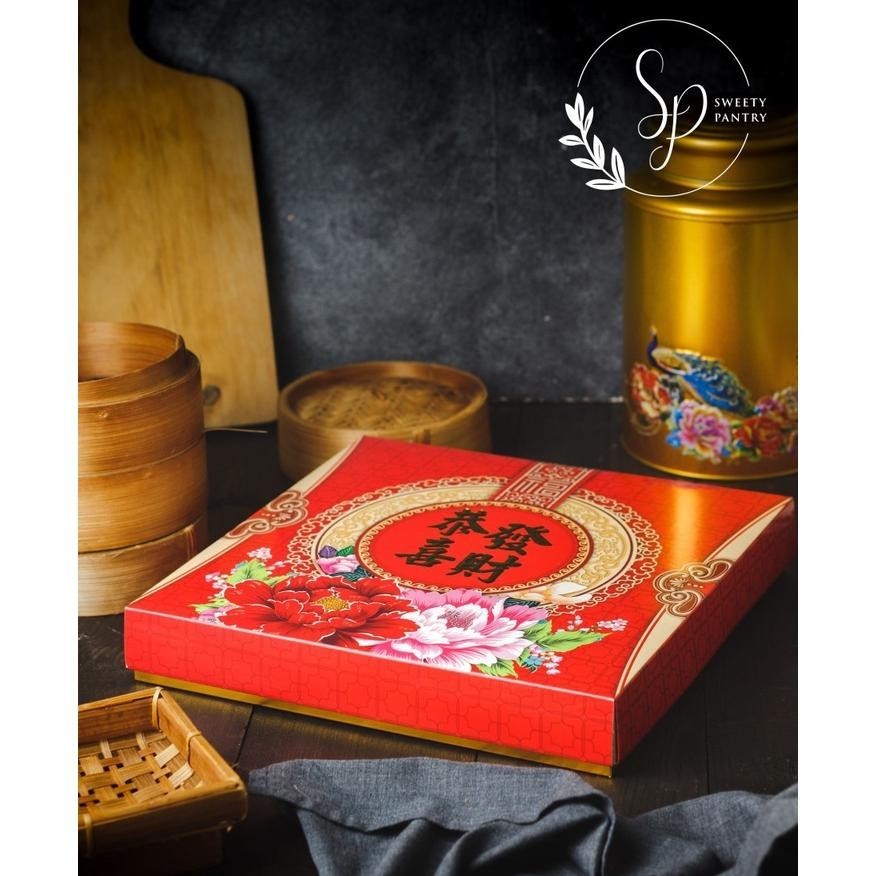 

TRE kotak box at Imlek Nastar Coklat 36 holes CNY mika emas TERLARIS