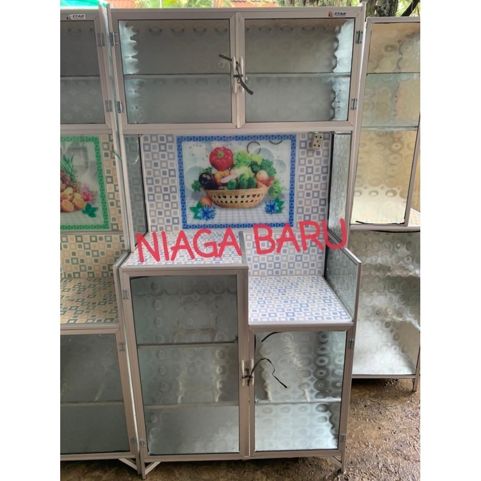 Rak Piring Kaca 2 Pintu Magic Buah Seng Bawah Keramik Bogor
