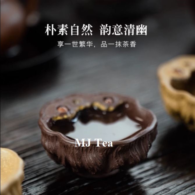 

Yixing purple sand lotus tea cup