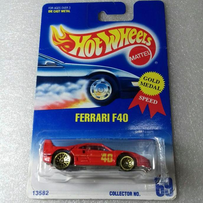 HOT WHEELS FERRARI F40. BLUE CARD 1991. GOLD MEDAL SPEED. OPEN HATCH.