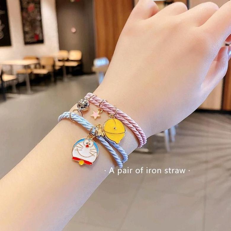NEW ARRIVAL 2 PCS/SEPASANG GELANG COUPLE MAGNET DORAEMON - GLG06 TERBARIK DI PAGE INI