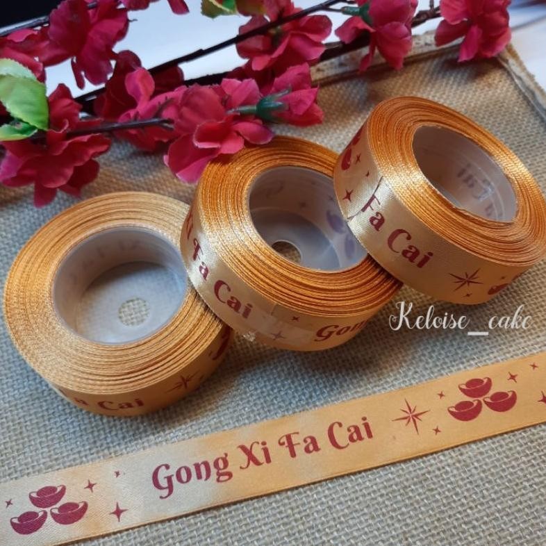 

TRY PITA CNY/IMLEK/CHINESE NEW YEAR WARNA GOLD UKURAN 2,5 CM-18 METER TERLARIS