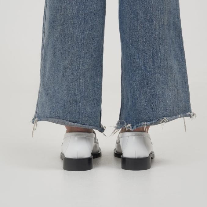 Prada Unlined Brushed Leather Loafers With Metal Triangle Logo White