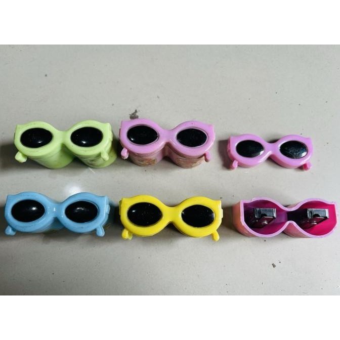 

rautan pensil 2 lobang bentuk kacamata satuan