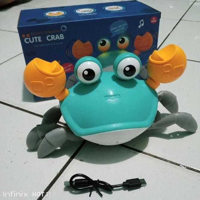 Mainan Kepiting Sensor Cas Lampu Dan Musik