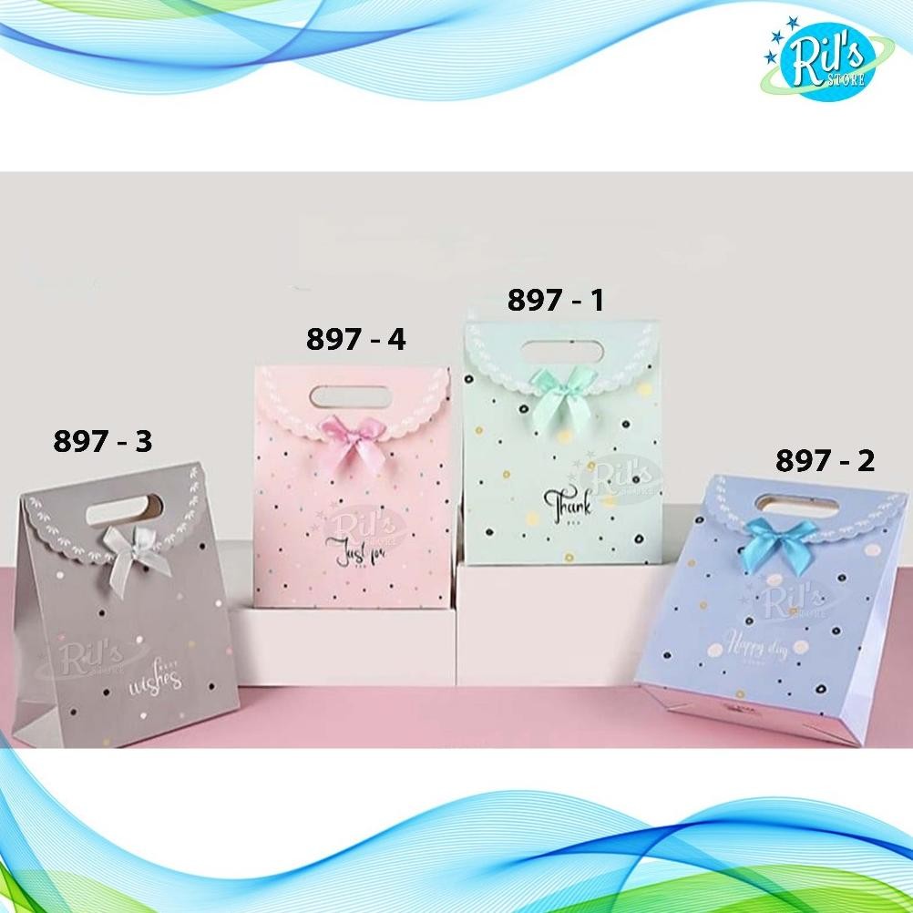 

Paperbag Glossy Premium Kecil 19x9.5x27cm - Paperbag Party Pond - Kado - Kecil - Pita Pond Nugi