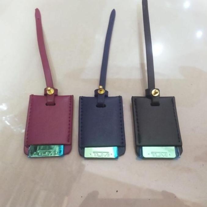 

Sale Accesories T U M I Name Tag Wanita