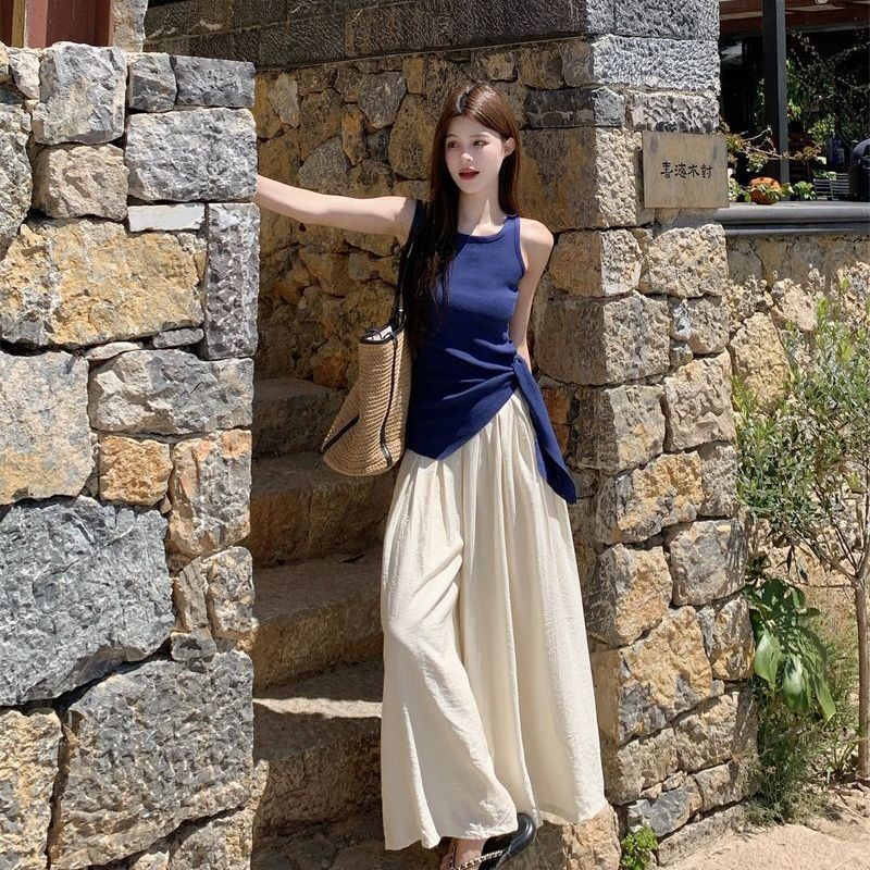 Verve WardrobeRompi Tidak Beraturan Tanpa Lengan Kaos Tali Ramping Celana Panjang Lebar Wanita Gaya 