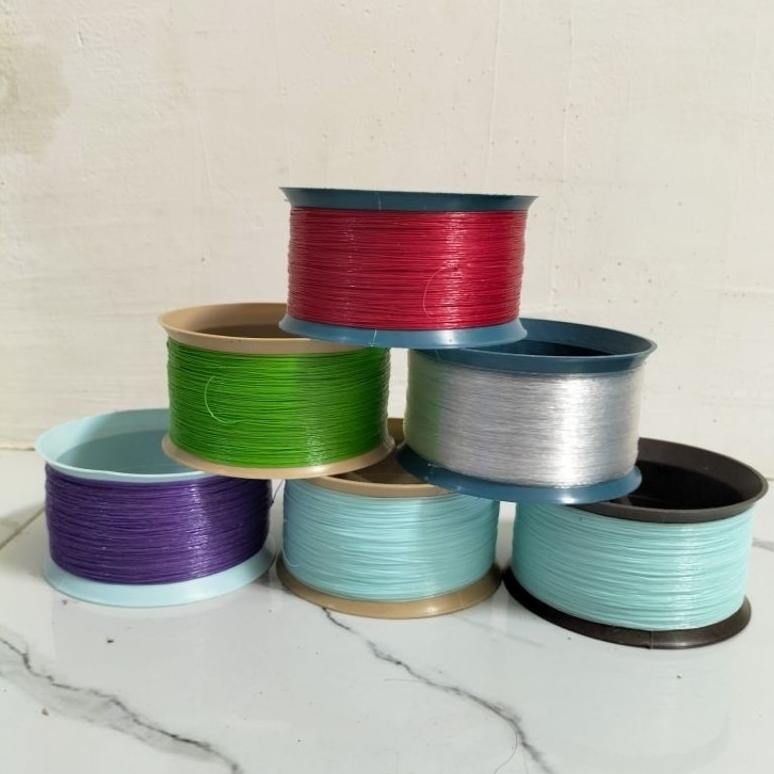 

NEW STOCK New GULUNGAN/KENUR ISI BENANG 0,40 PLASTIK TEBAL ANTI PECAH DAN TAHAN BANTING/BENANG LAYANG-LAYANG