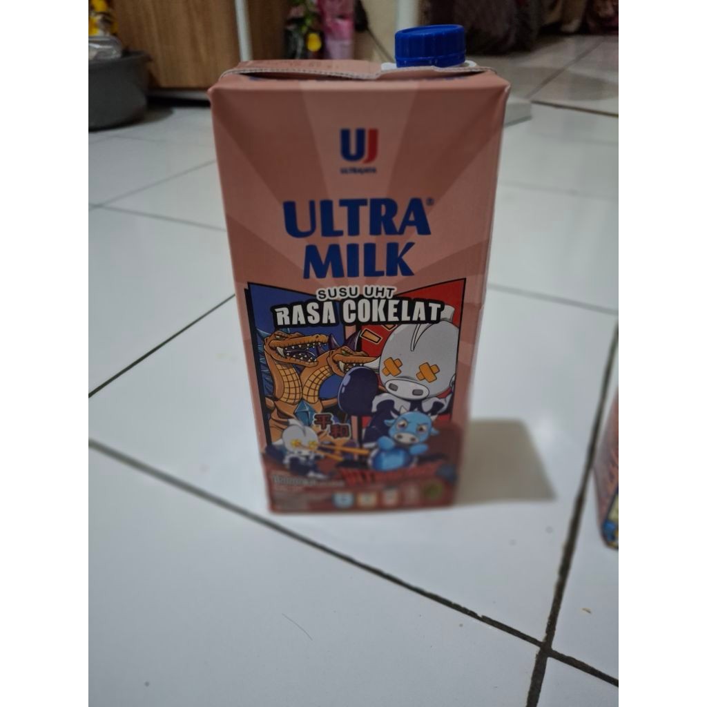 

susu ultra coklat 1 liter kemasan ultraman