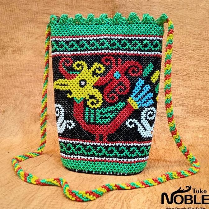 Tas Manik Anjat Motif Dayak Co